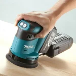 Makita Έκκεντρο Τριβείο 125mm Μπαταρίας 18V 2x5Ah με Ρύθμιση Ταχύτητας και με Σύστημα Αναρρόφησης DBO180RTJ - Image 4